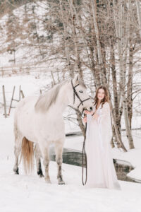 girl with her horse that benefits from equine osteopath therapist visits