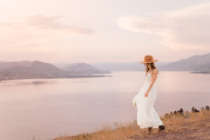 bride at sunset with Kelowna wedding hair and makeup