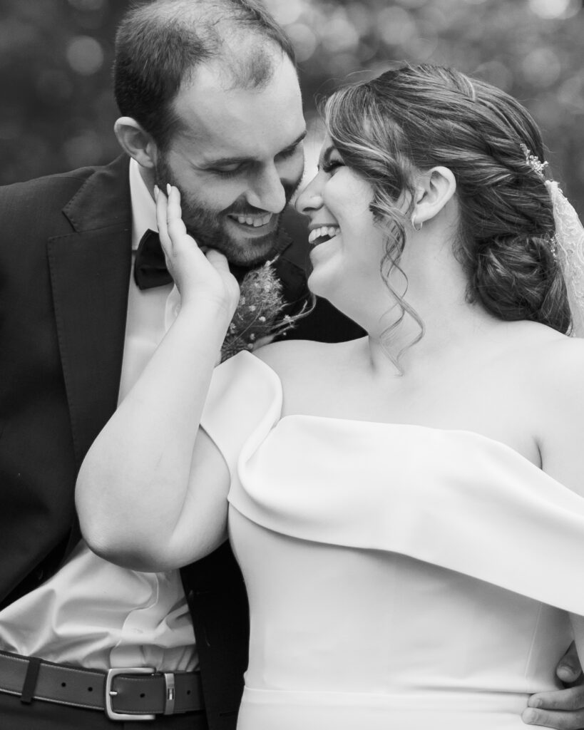 couple laugh together at a linden gardens wedding