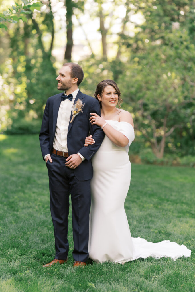 couple stand next to one another at a linden gardens wedding