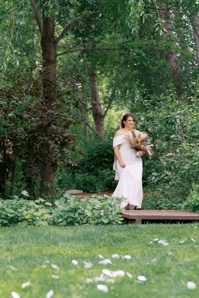 bride walks down the aisle at a linden gardens wedding
