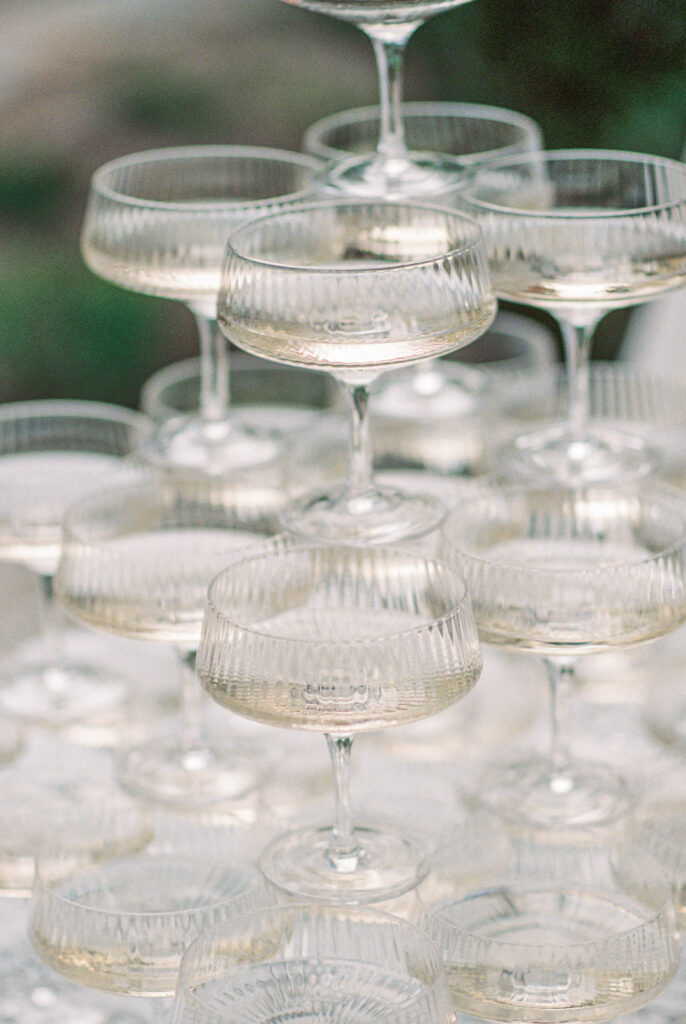 champagne tower at a welcome dinner at a chateau okanagan wedding